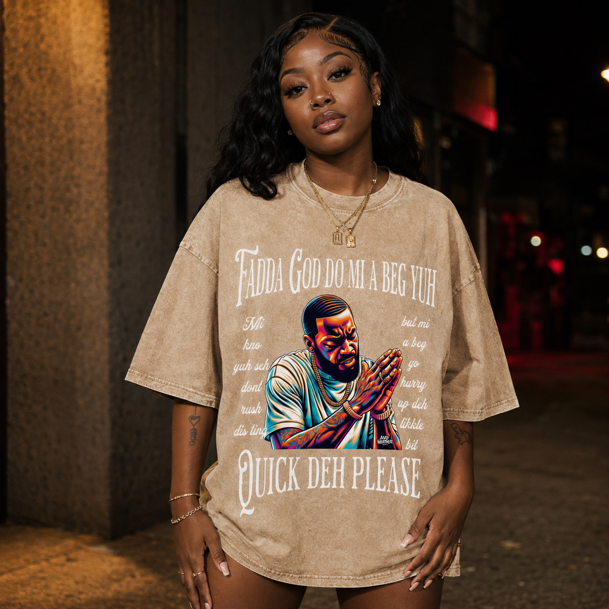 Female model front view wearing apricot Fadda God Mi a Beg Yuh oversized T-shirt