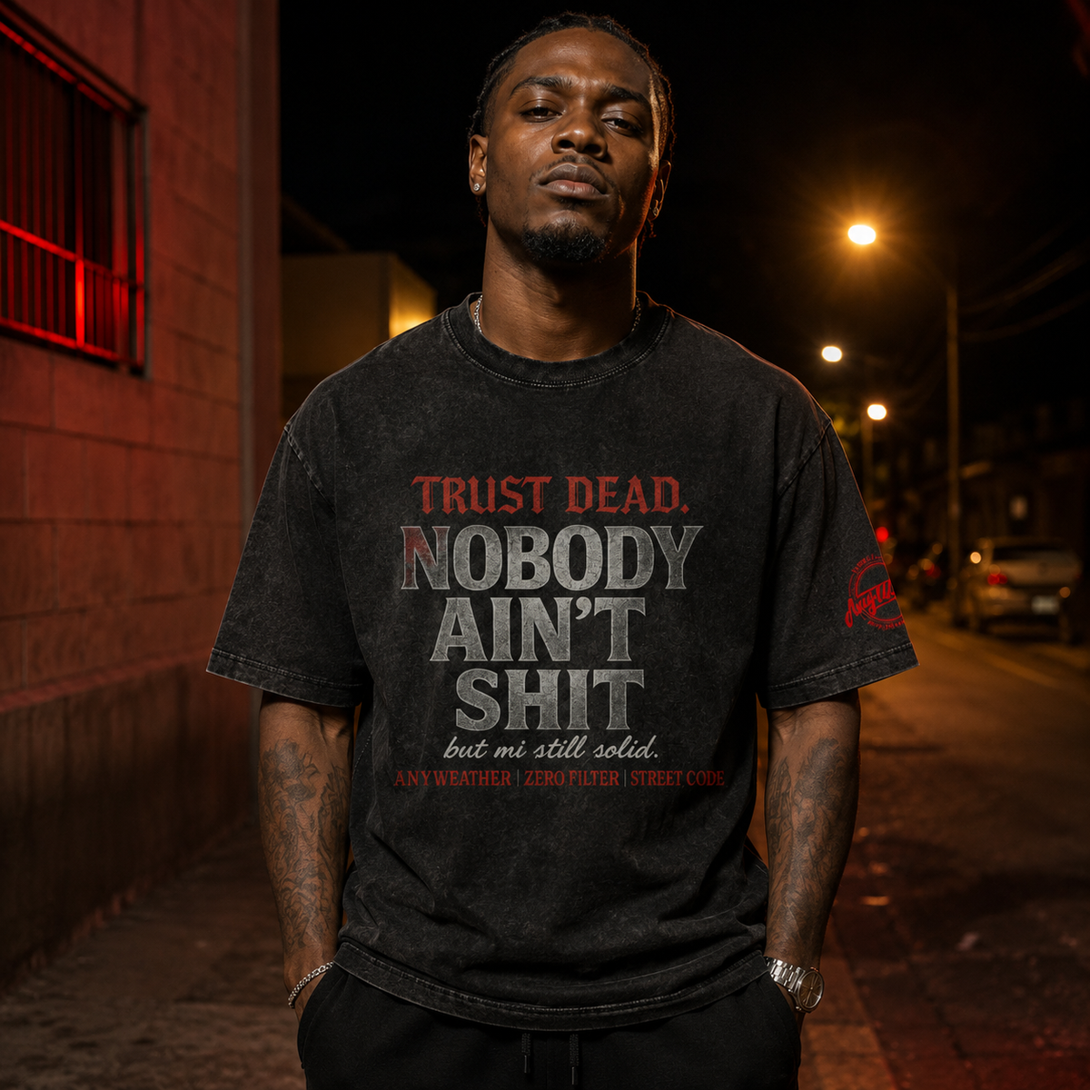 Male model front view wearing black Nobody Ain't Shit oversized T-shirt