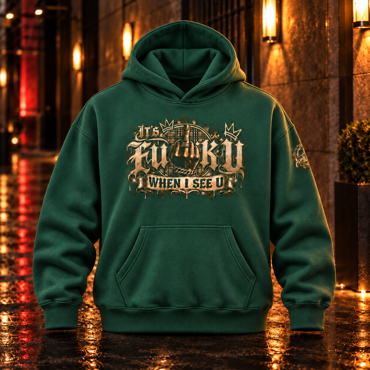 Front view of the Eden Green Anyweather FUCK U WHEN I SEE U oversized fleece hoodie in a wet nighttime corridor