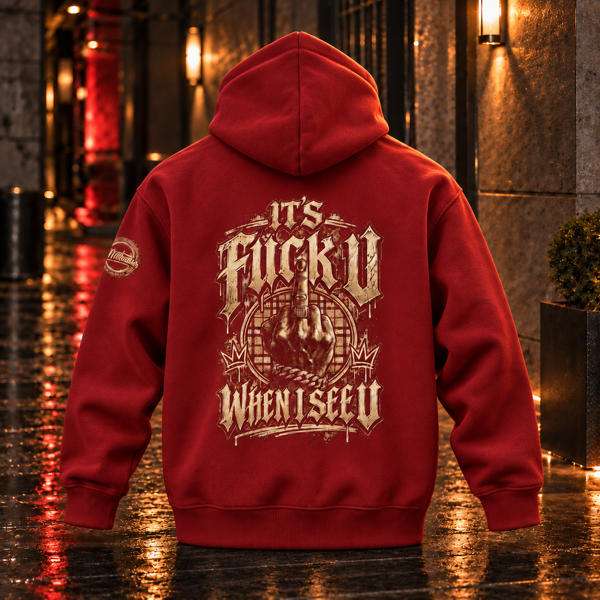 Back view of the Red Anyweather FUCK U WHEN I SEE U oversized fleece hoodie in a wet nighttime corridor