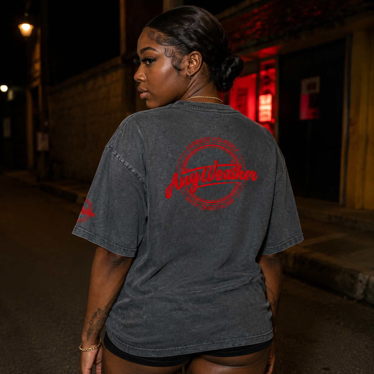 Female model back view wearing pirate gray Nobody Ain't Shit oversized T-shirt